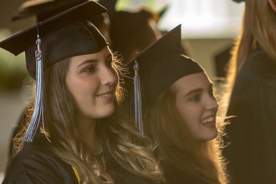 Interlochen Arts Academy student attend graduation inside Kresge Auditorium