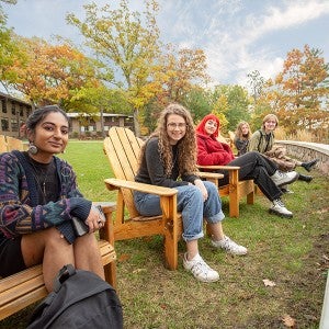 Academy students relaxing near the lake