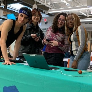 Student volunteers host the Act for Art kick-off party on May 3, 2023. 