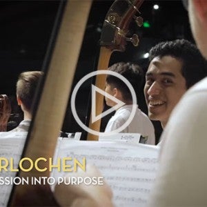 Students prepare for a performance