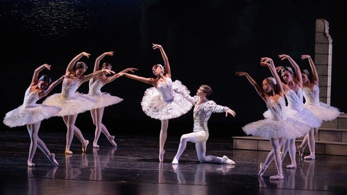 Odette, her maidens, and Prince Siegfried at the lake.