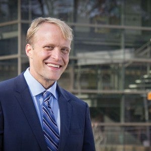 President Trey Devey in front of the Dow Center for Visual Arts