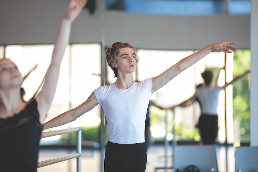 Male dancer practices inside the Dance Center