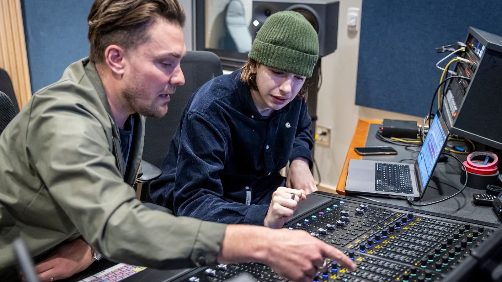 Two people in a recording studio