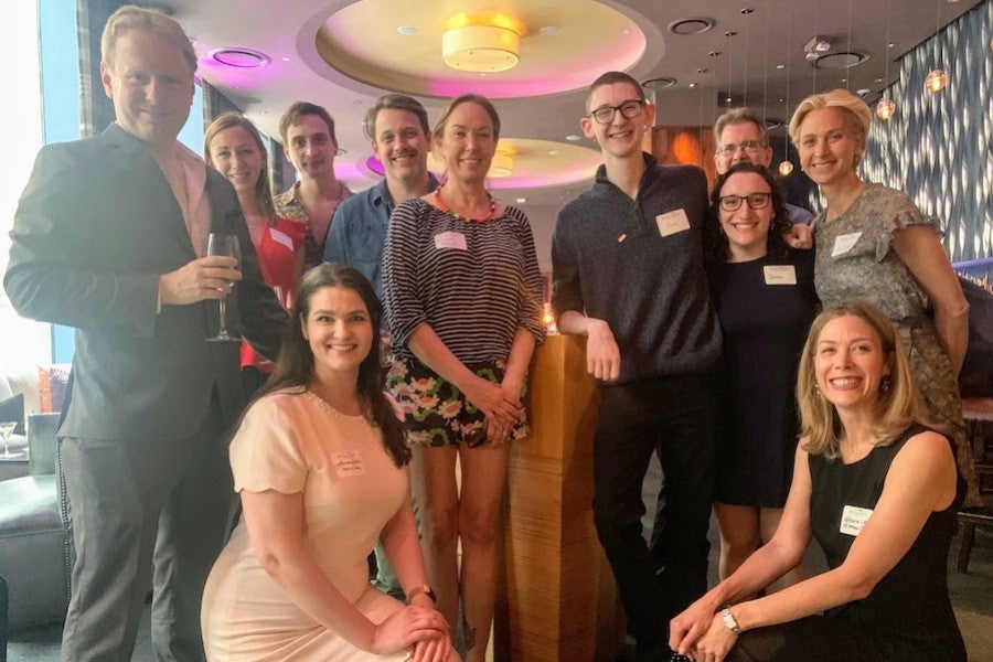 A group of alumni and staff members