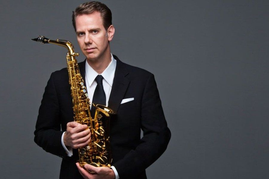 Tim McAllister with sax.