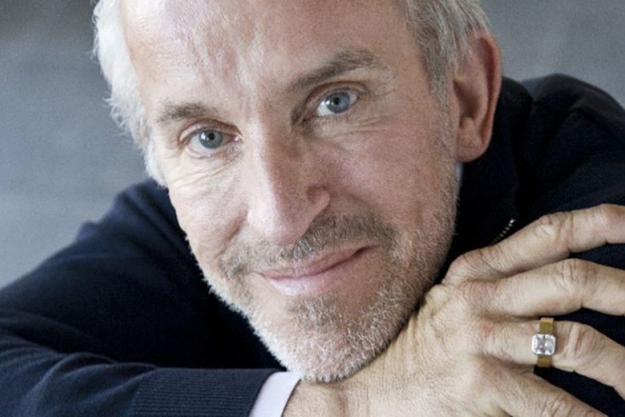 A smiling middle-aged man