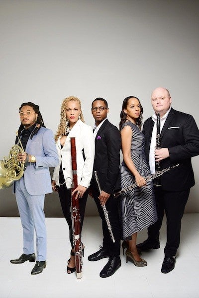 Professional photo of five musicians