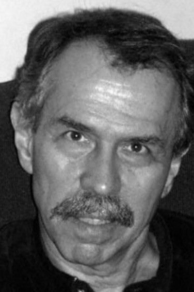 Professional portrait of Peter Lawrence