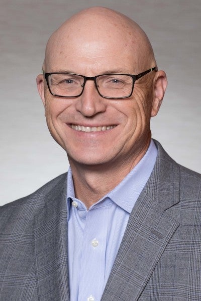 Headshot of Tad Smith