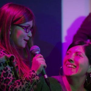 A girl performs with the Popular Music Ensemble